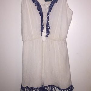 WHITE ROMPER WITH BLUE DETAILING